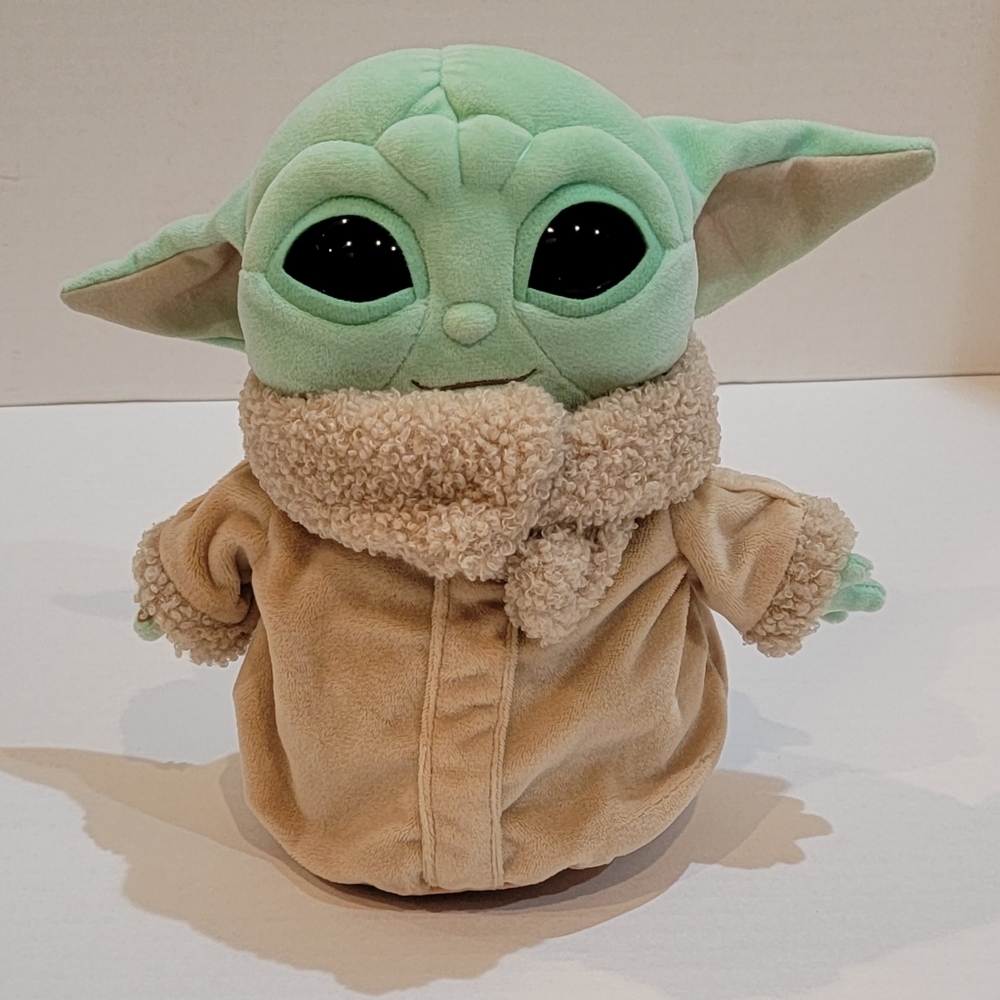 Star Wars Baby Yoda.  8.5" in height.  Has beanbag bottom to keep upright.